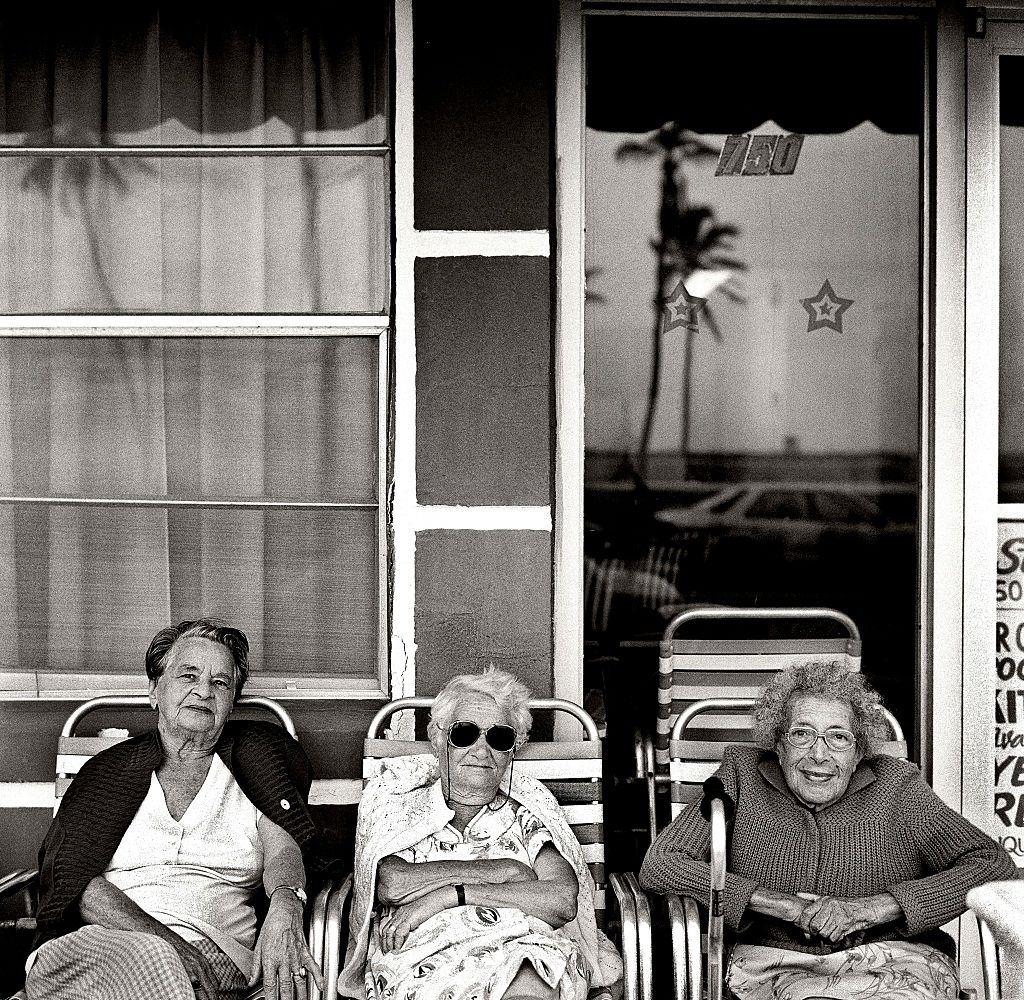 #73 Retirees in hotel porch, Miami Beach, Florida.