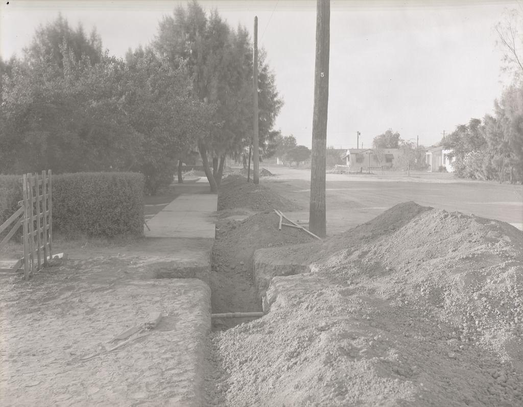#83 Ditch and Exposed Piping at the End of a Residential Property, Phoenix, 1940