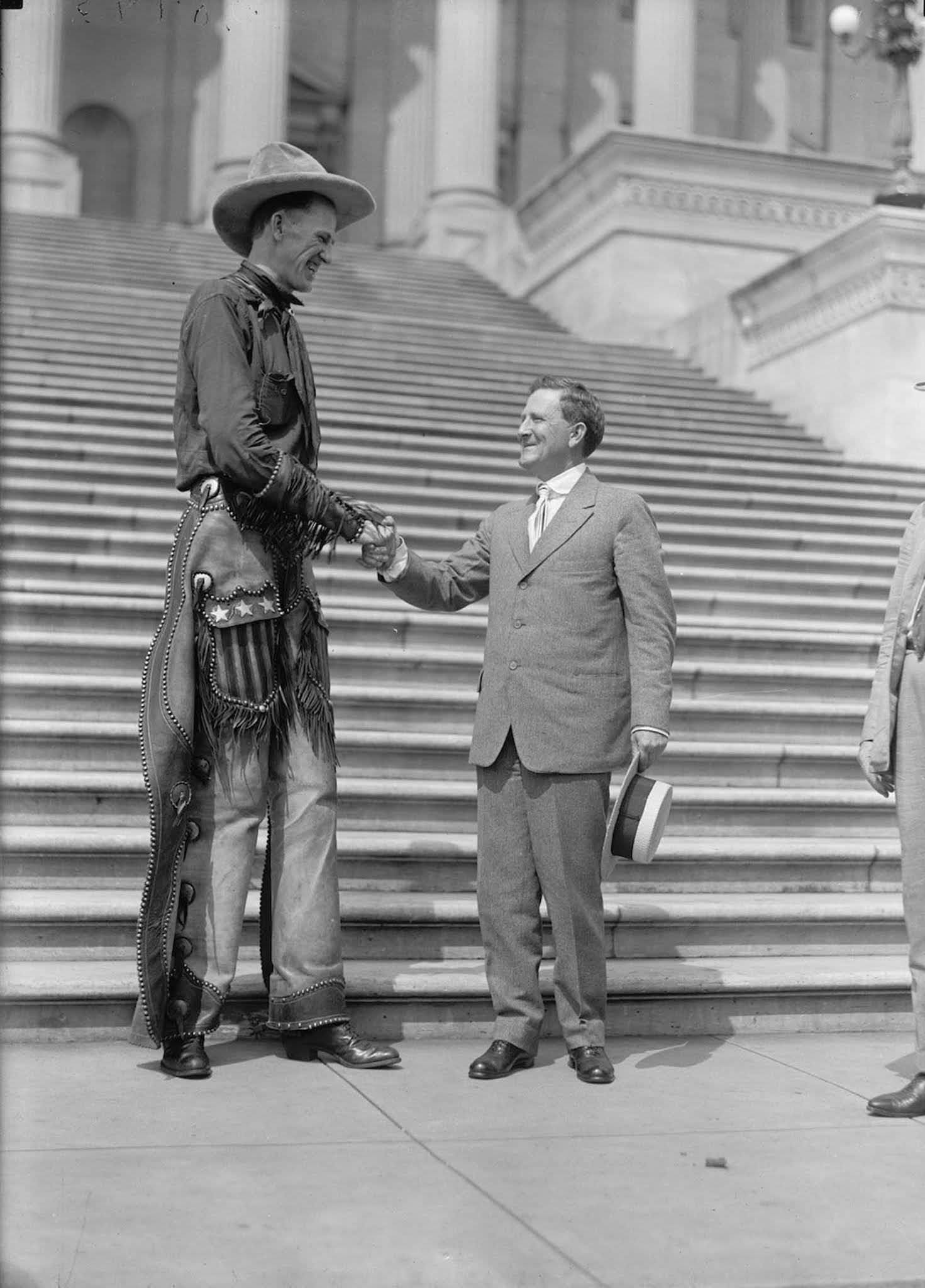#2 Madsen shaking hands with Senator Morris Sheppard at the capitol. 1919.