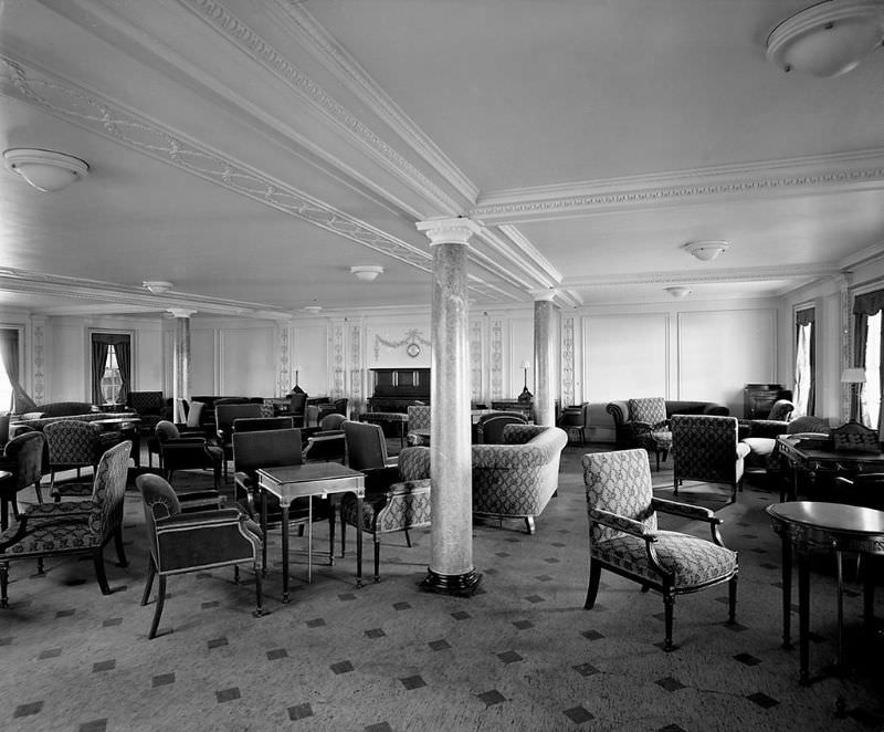 Aquitania’s 2nd Class Lounge. The Louis XVI-style Second Class Lounge was on the Promenade Deck (D Deck). This is a view from the port side, looking towards the piano at the after end, May 1914