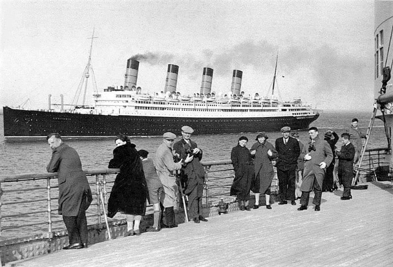 Aquitania, photographed from North German Lloyd’s Europa as both liners depart New York in April 1939