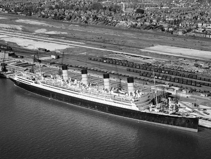 A final view of Aquitania, affectionately known throughout her long life as the ‘Ship Beautiful’. She rests at Berth 107, Southampton Western Docks in September 1949