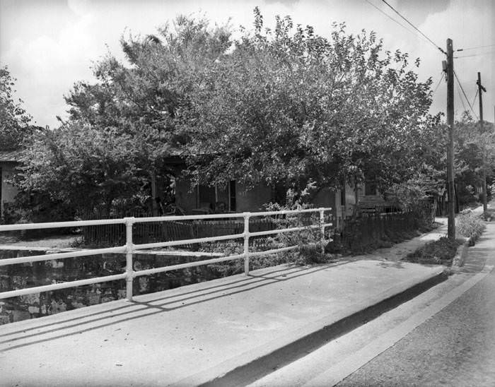 #85 Front of small brick and tile house, 417 Camaron Street, San Antonio, 1968