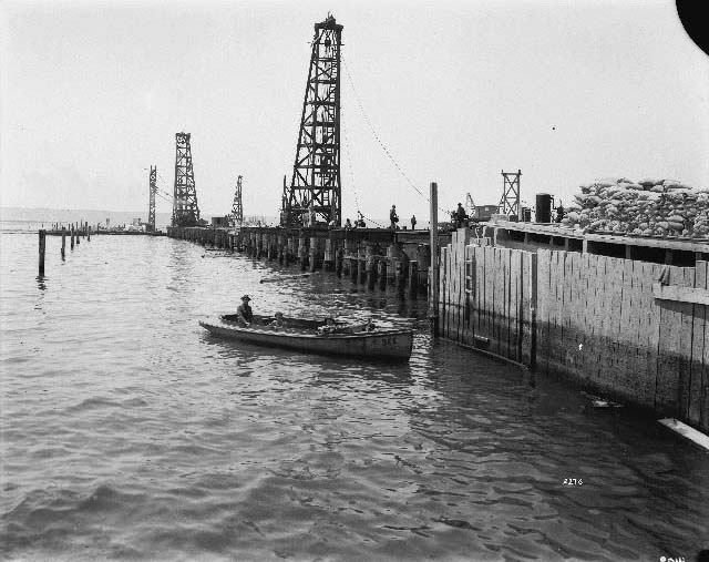 #57 Construction workers building the municipal wharf in downtown San Diego, 1895