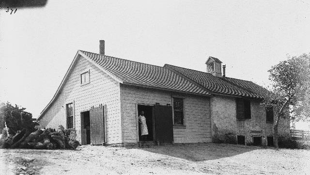 #73 A man standing in the doorway of the Santa Ysabel Dairy, 1895
