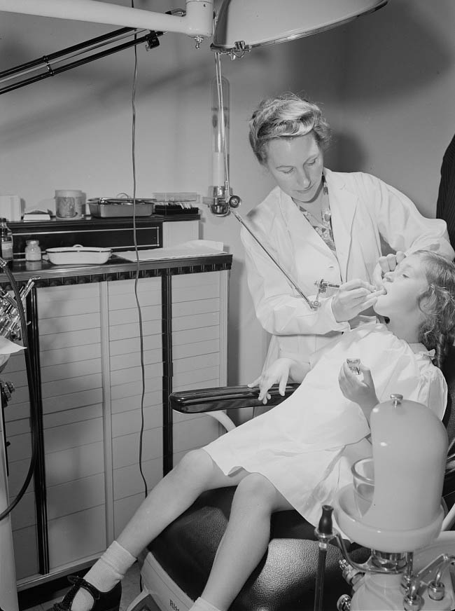 #77 A little girl is having her teeth fixed in the Center’s modern dental clinic, 1942