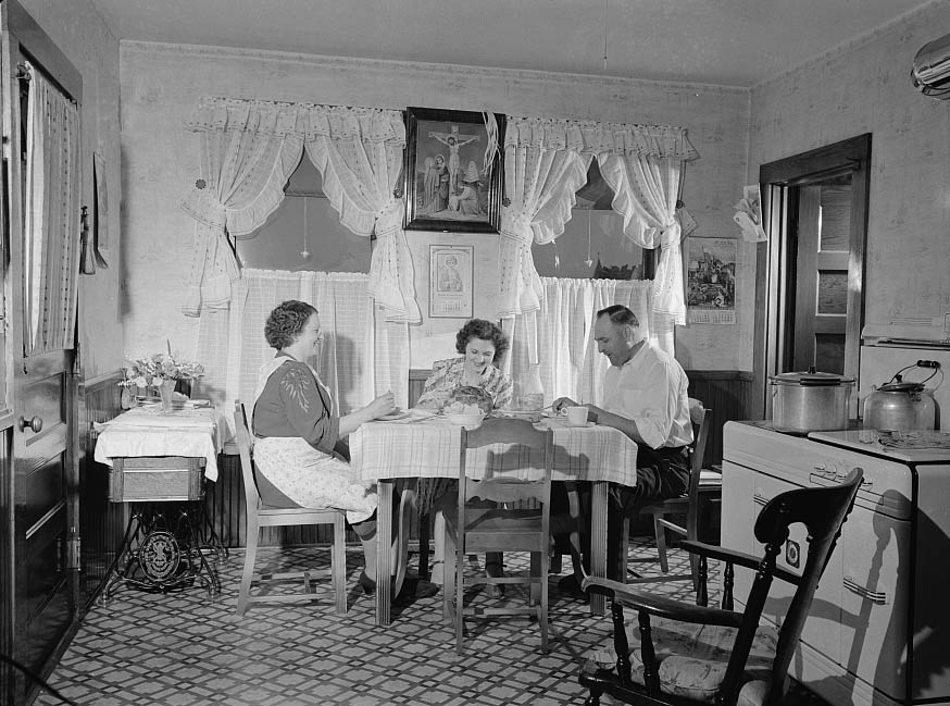 #8 Ralph Eurlbut and his family at mealtime, 1942