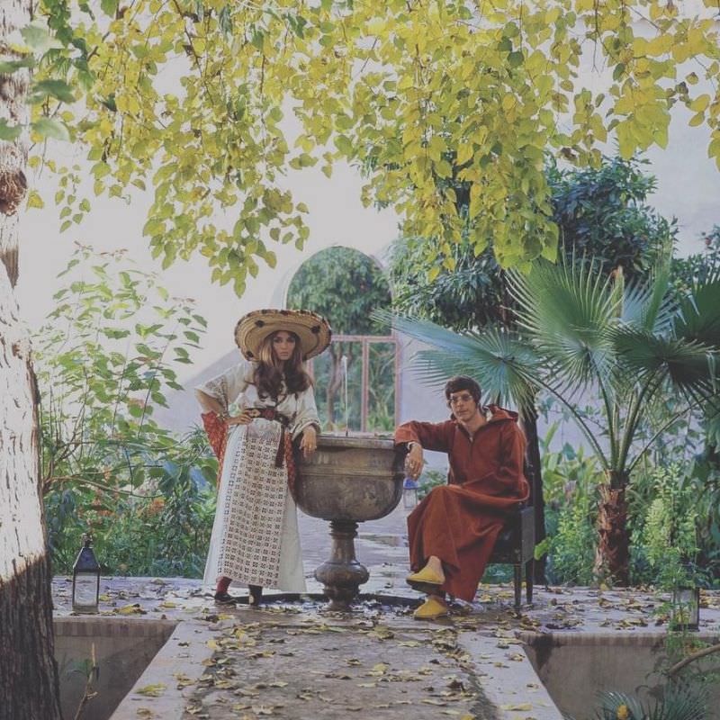 #19 Paul and Talitha Getty by a fountain in their garden in Marrakesh, Morocco, January 15, 1970