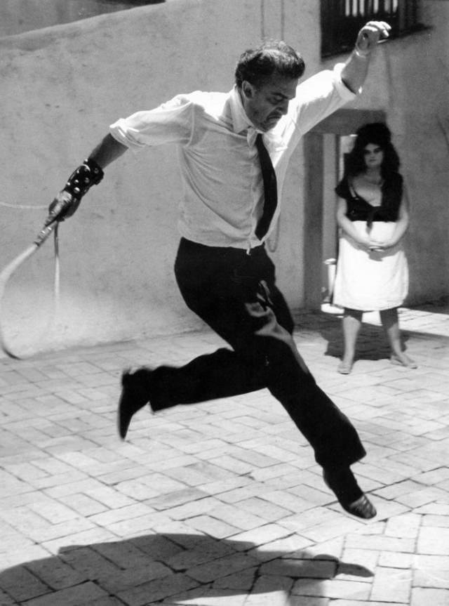 #20 Fellini jumping on the set of 8 1/2, 1963