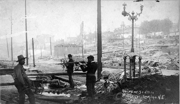 Two guards arresting a looter in the ruins, 1889