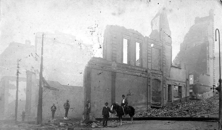 Ruins of Frye’s Opera House at Northeast corner 1st Ave. and Marion St, 1889