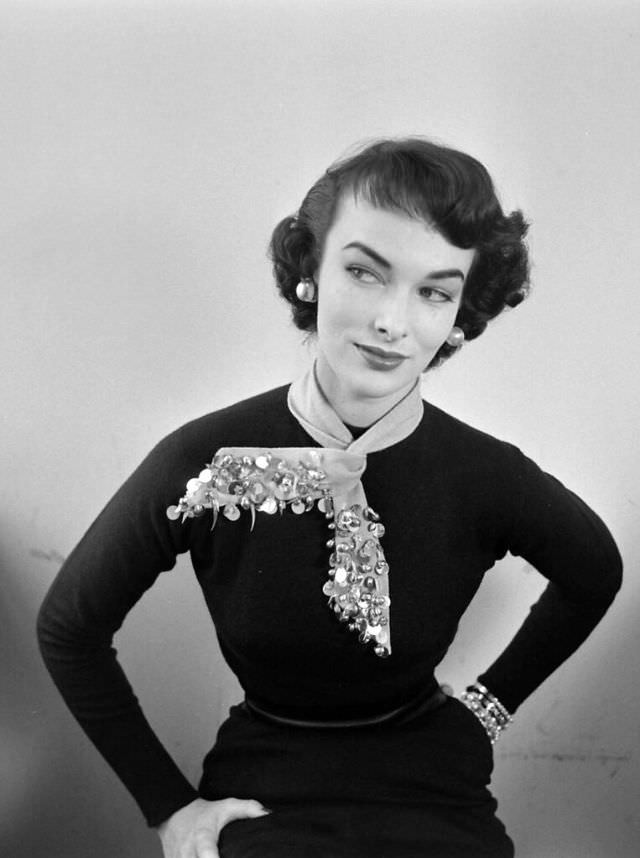 #13 Victoria von Hagen shows how to accessorize a plain sweater, 1952