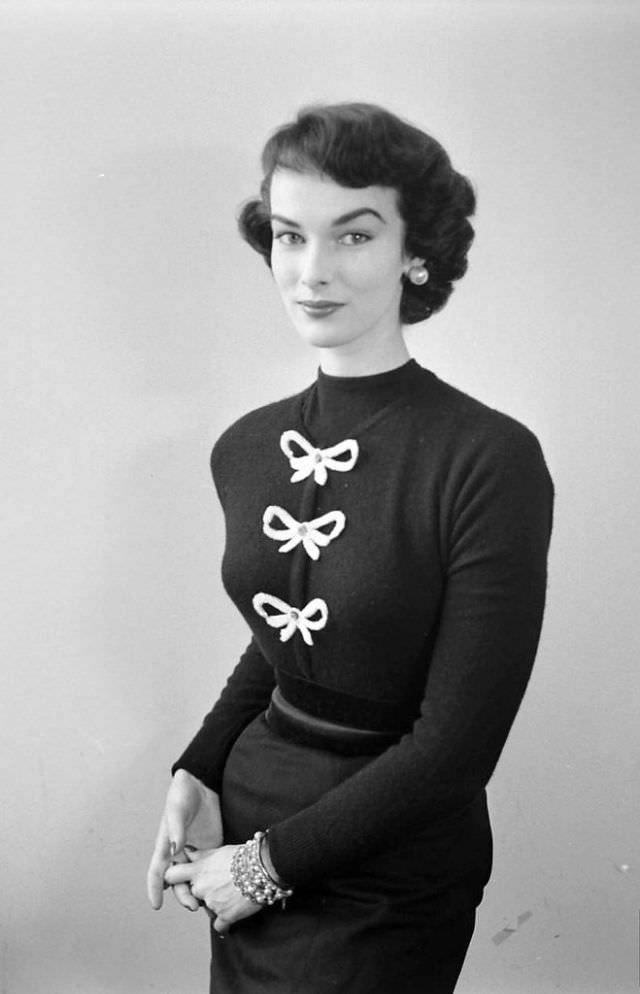 #4 Victoria von Hagen in sweater adorned with bows, September 1952