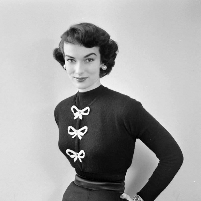 #5 Victoria von Hagen in sweater adorned with bows, September 1952