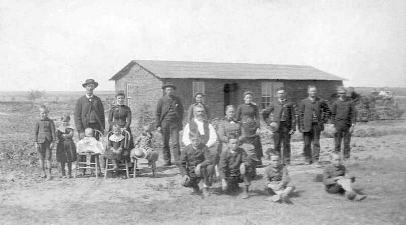 #1 Burton family with sod house, Bartley, Nebraska