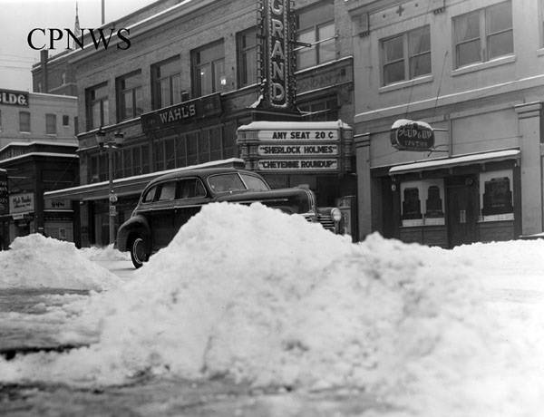 #19 After a snowstorm, in downtown Bellingham: holly street, block west of Cornwall (dock St.), 1940.