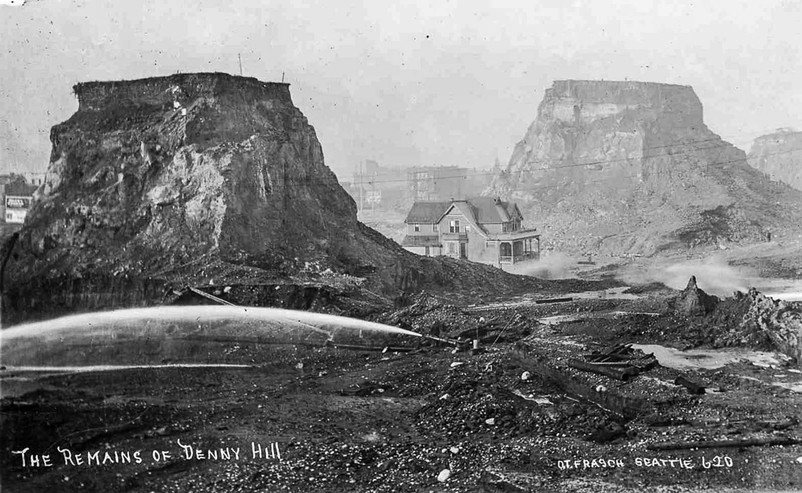 #1 Denny Hill is slowly washed away by powerful water cannons. 1910.