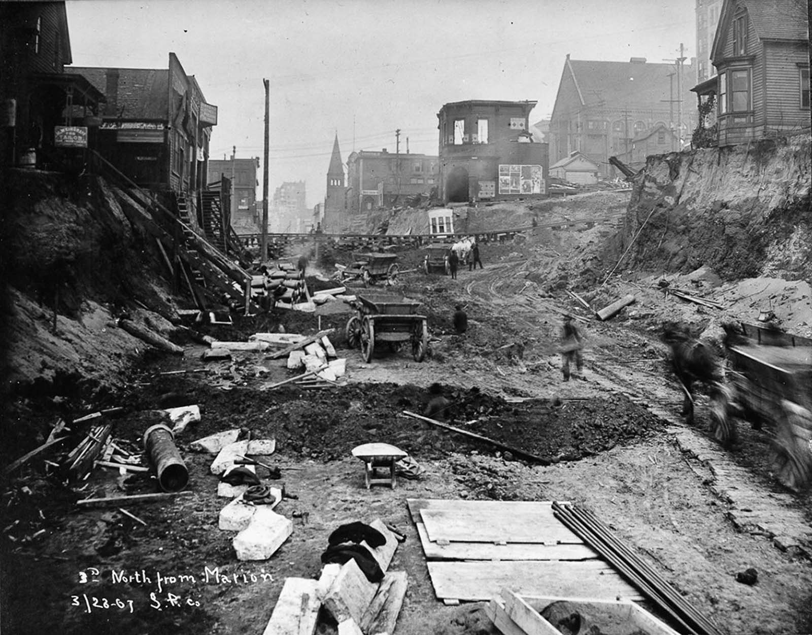 #4 Third Avenue north of Marion Street is flattened out in the first Denny regrade. 1907.