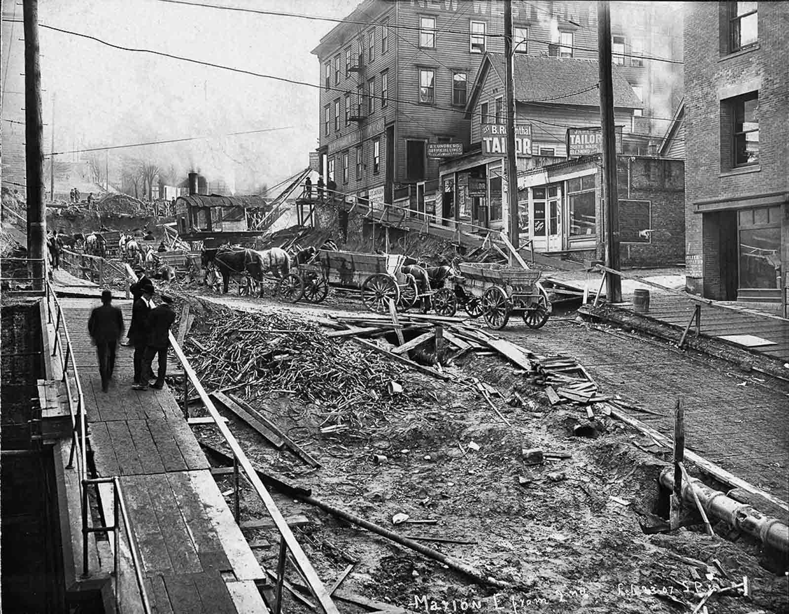 #6 Horse teams march up Marion Street. 1907.