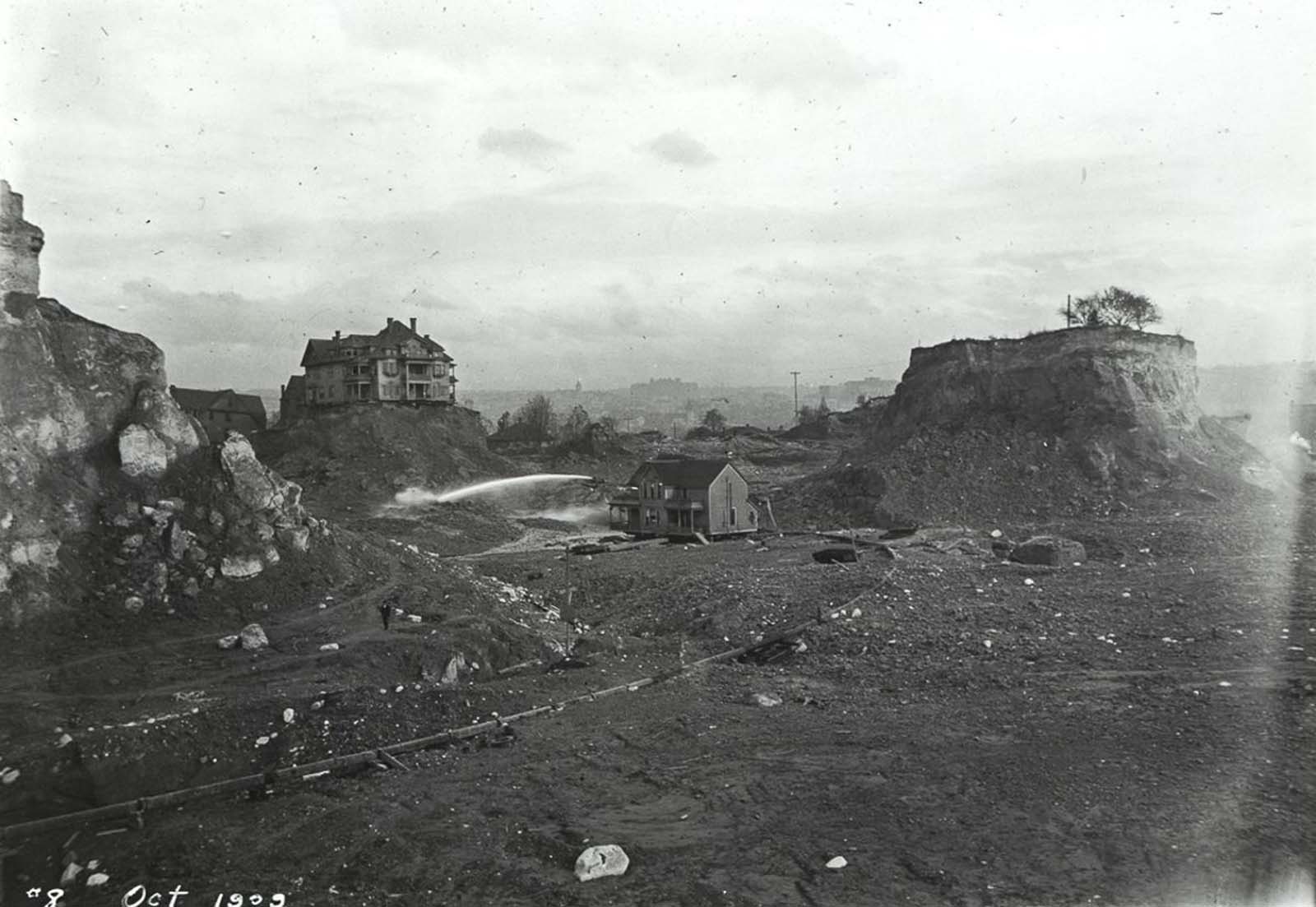 #8 A few “spite mounds” stand amid the flattened remains of Denny Hill. 1909.