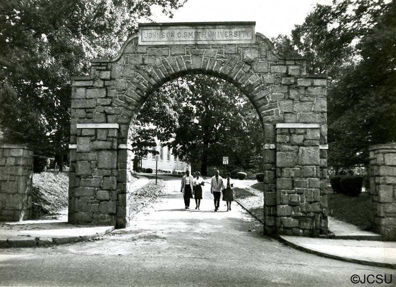 #31 Entrance arch with students, 1970s