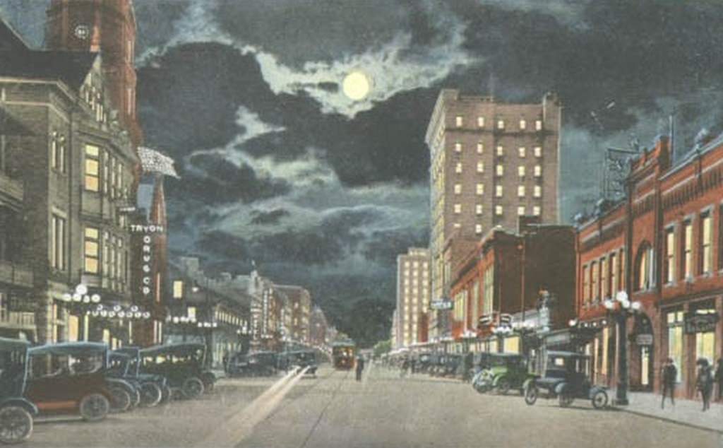 #61 The 100 block of North Tryon Street at night, 1925
