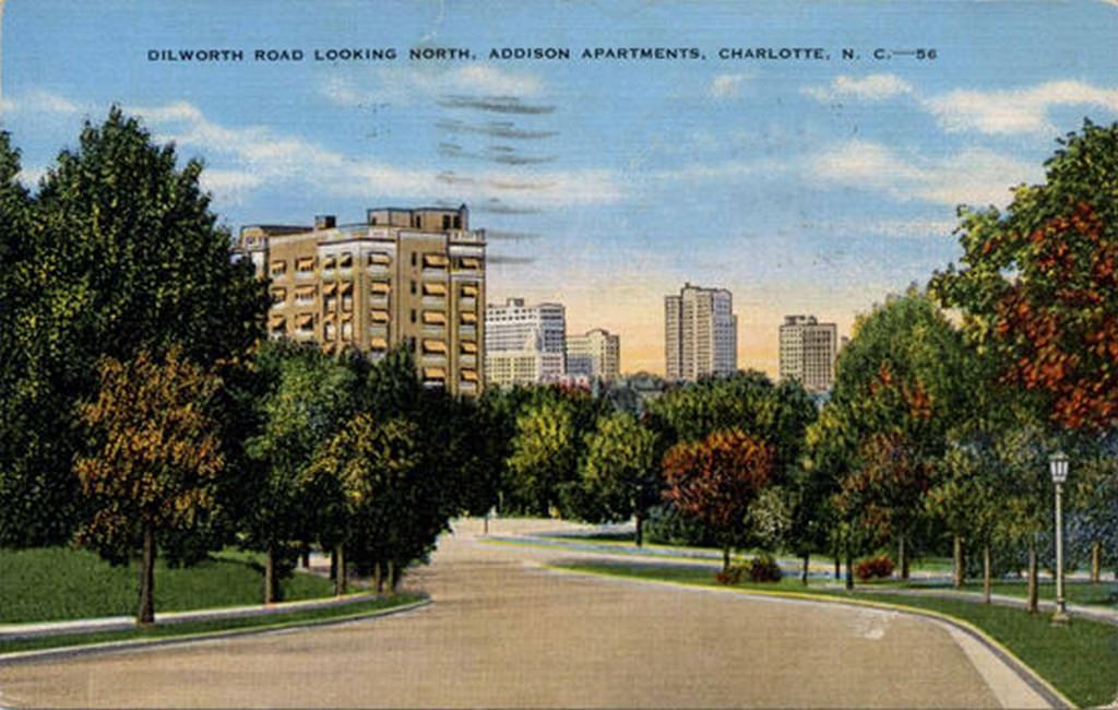 #93 East Trade Street with a view of a trolley and a horse and buggy, 1900