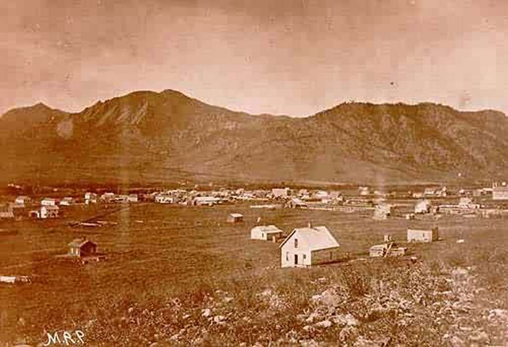 #64 Early photo of Boulder Looking West, 1870
