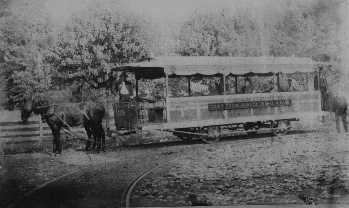 #112 Horse Trolley before the old car barn, 1890.