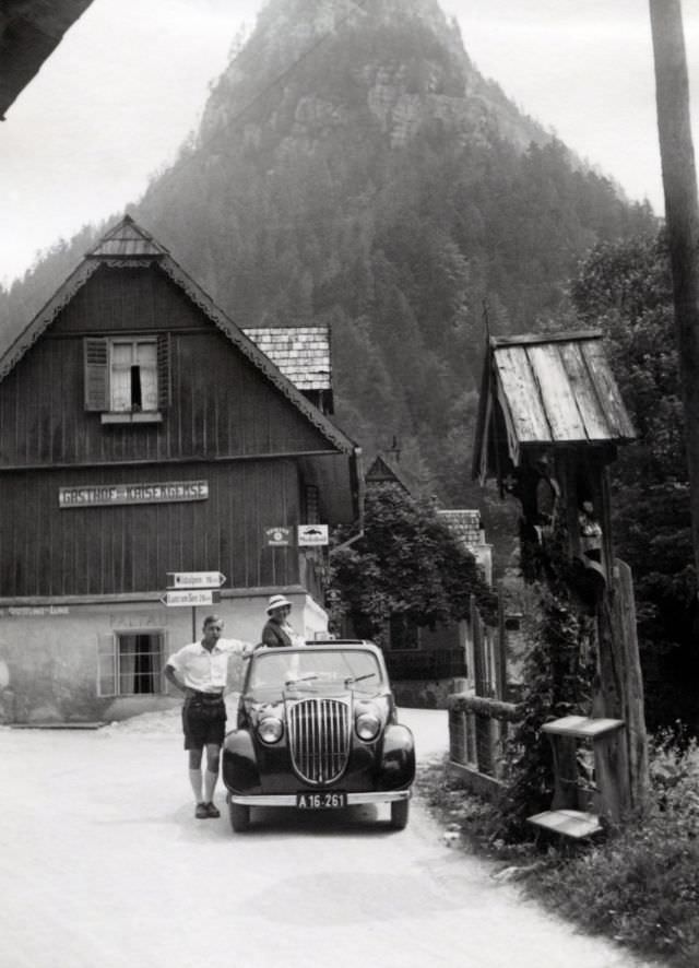 #21 A stylish couple posing with a Steyr 50 in the Styrian village of Palfau, rural Austria.