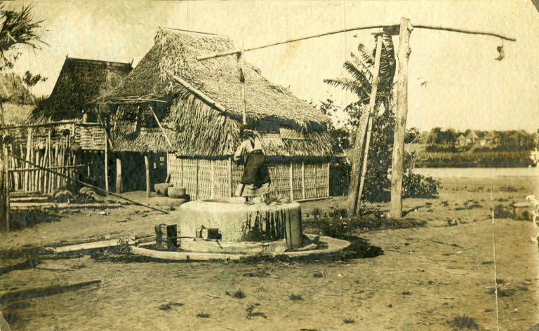#97 Villager at Community Well, 1899