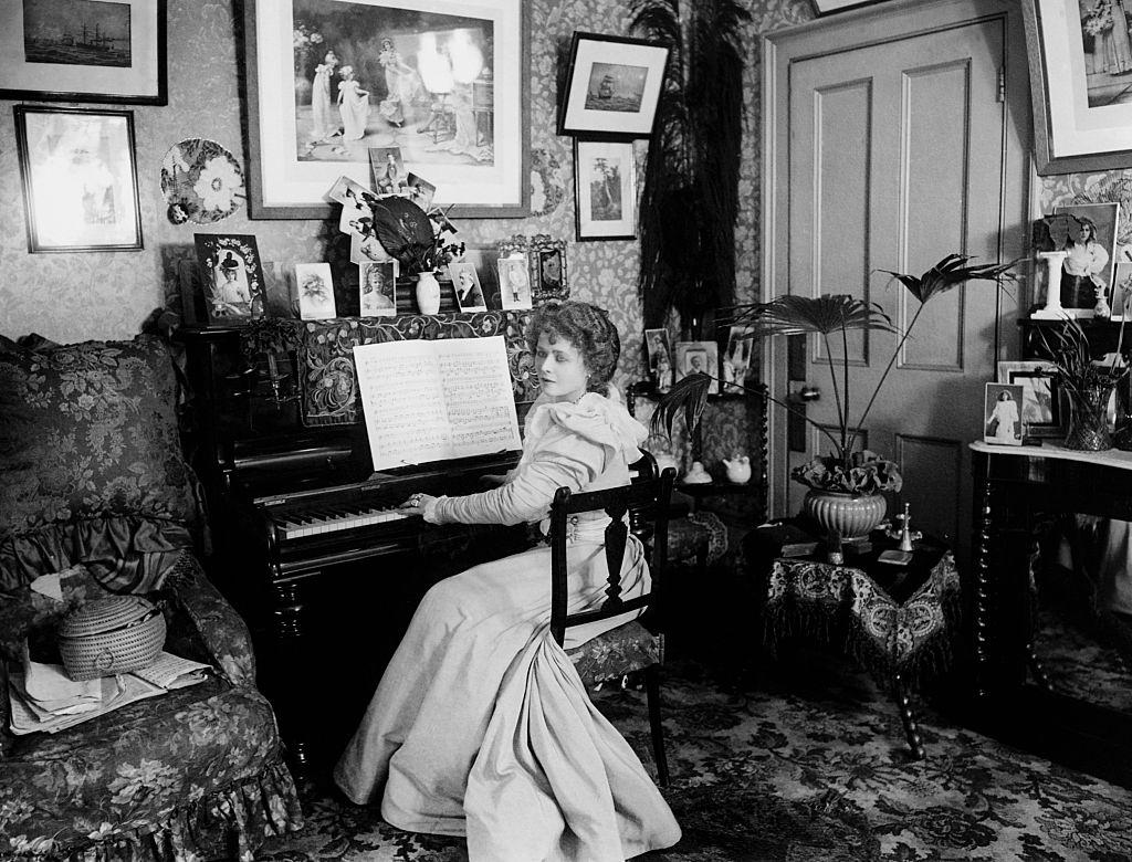 #14 Mabel Love Playing the Piano, 1918.