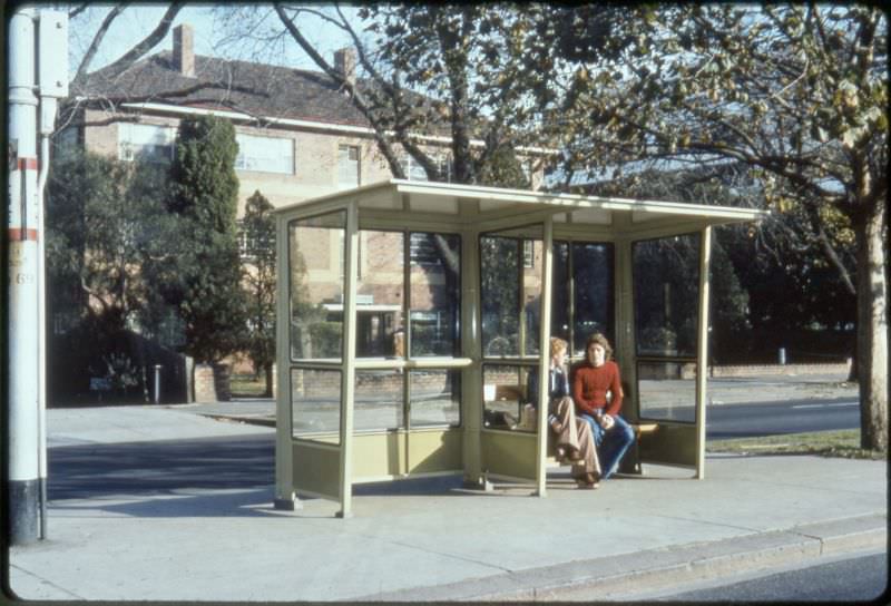 #40 Waiting for public transport to arrive, Melbourne, circa 1970s