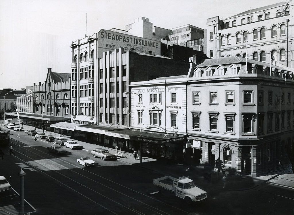 #21 Elizabeth Street in Melbourne between Lonsdale and Little Bourke Streets with Myer emporium in the background and the Post Office Hotel in the foreground, 1970