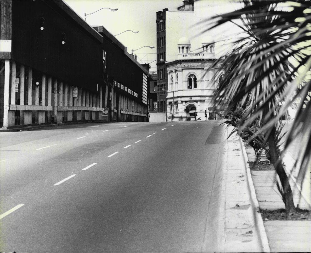 #49 The Partially deserted scene on Broadway (Looking north) as the Melbourne Cup was running, 1976