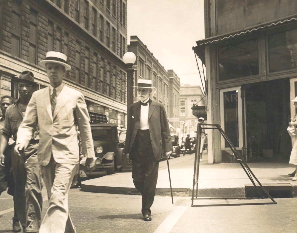 #3 James E. Caldwell walking on 4th Avenue, 1937