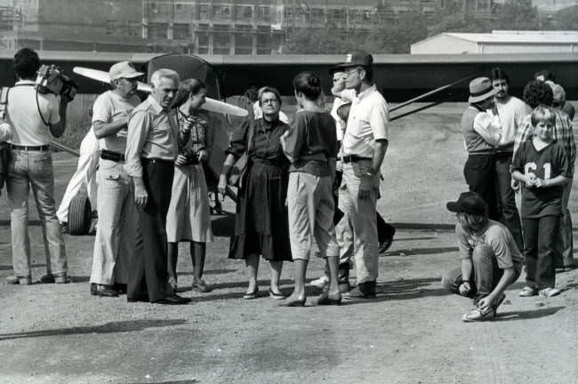 #4 Mayor Fulton and a group of people standing around an airplane that appeared at the 1982 Courthouse Day hosted in Nashville, Tennessee.