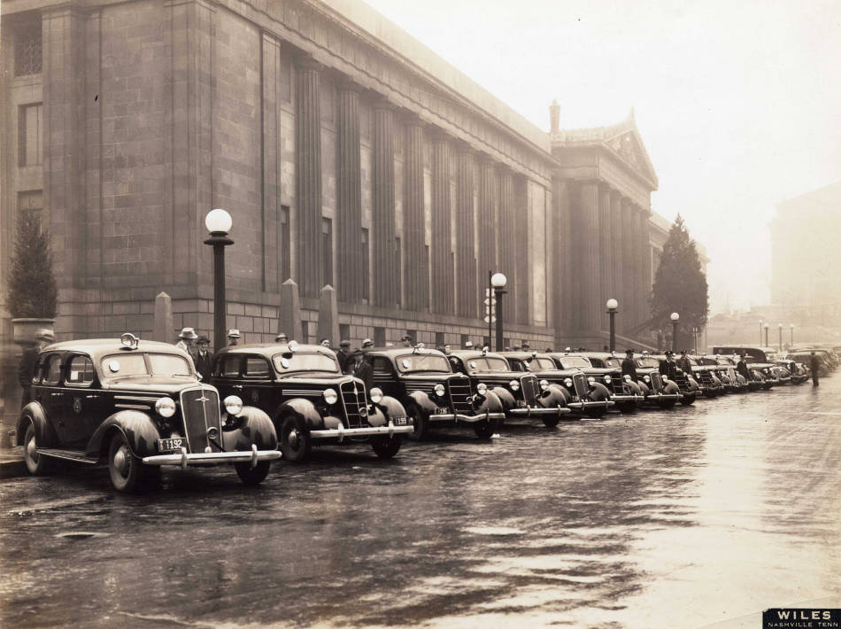 #88 Police cars and officers in front of War Memorial Building in Nashville, Tennessee, 1935
