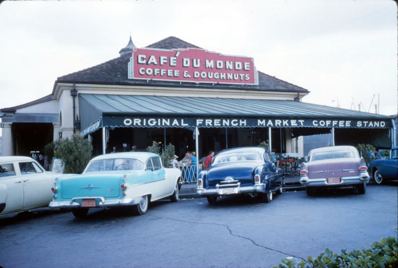 #138 Cafe du Monde and parked cars, New Orleans, 1956.