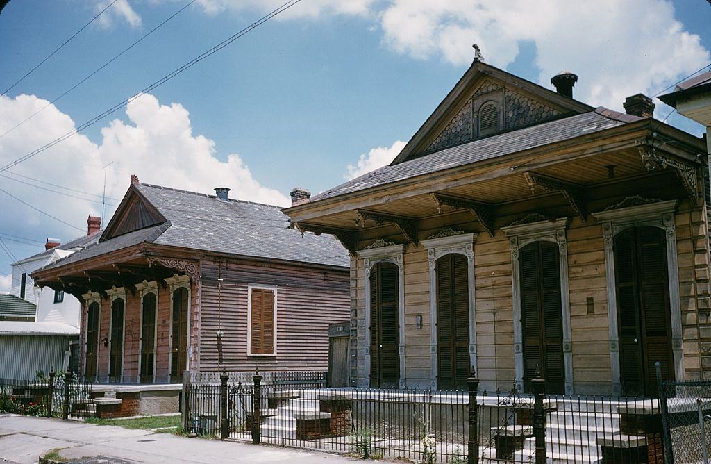 #49 A street view of boarded up homes in New Orleans, 1957.