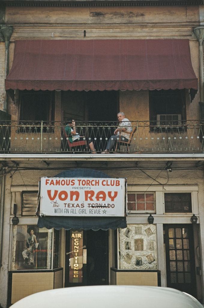 #122 A sign advertising ‘Von Ray – The Texas Tornado’ outside New Orleans nightclub ‘The Torch Club’ on Bourbon Street, New Orleans, 1953.