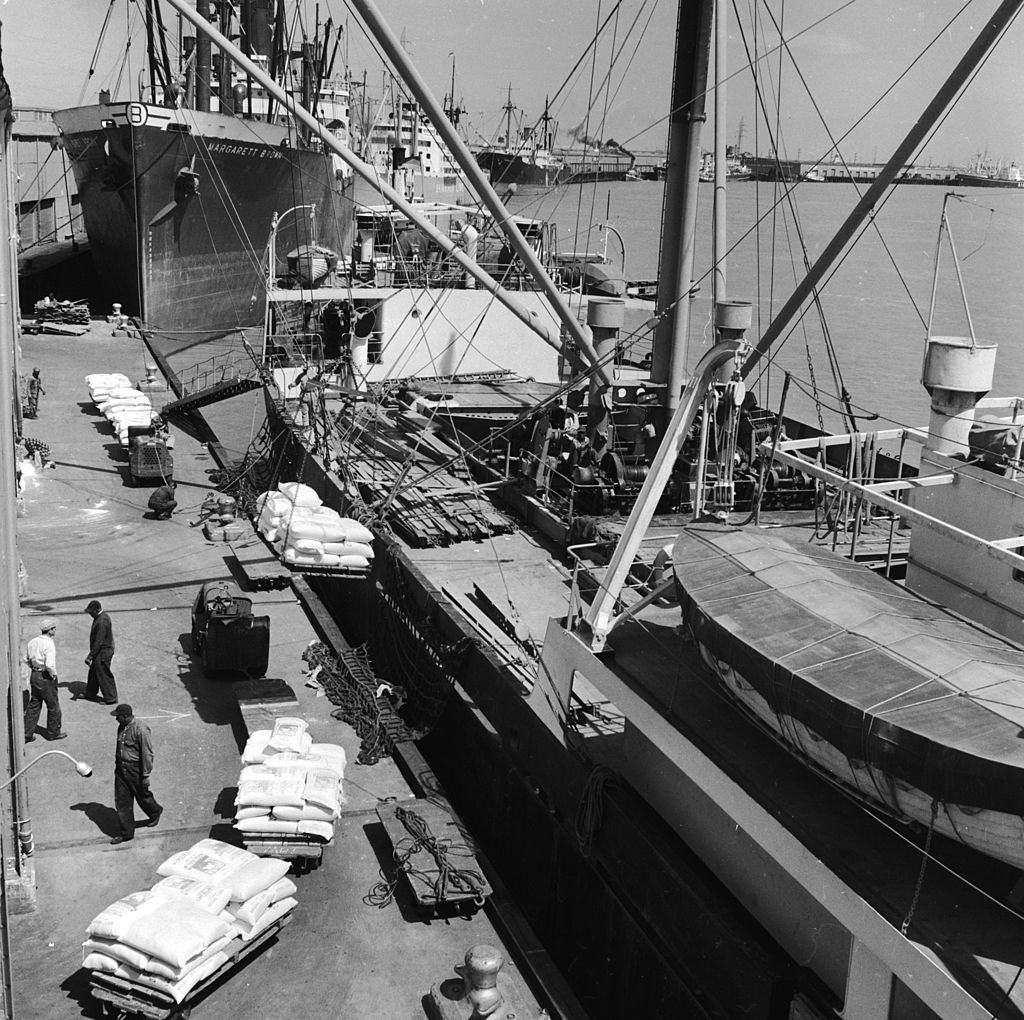 #9 Cargo being loaded onto freight ships in New Orleans dock, 1950.