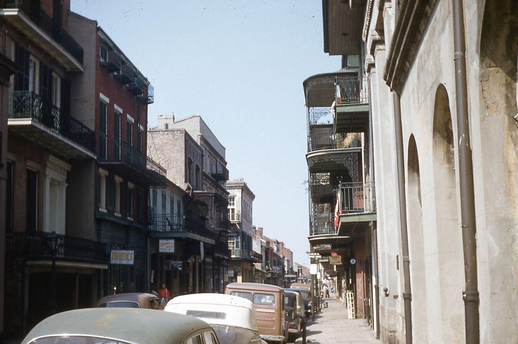 #126 View facing northwest of Saint Peter Street, in the French Quarter of New Orleans, June, 1953.