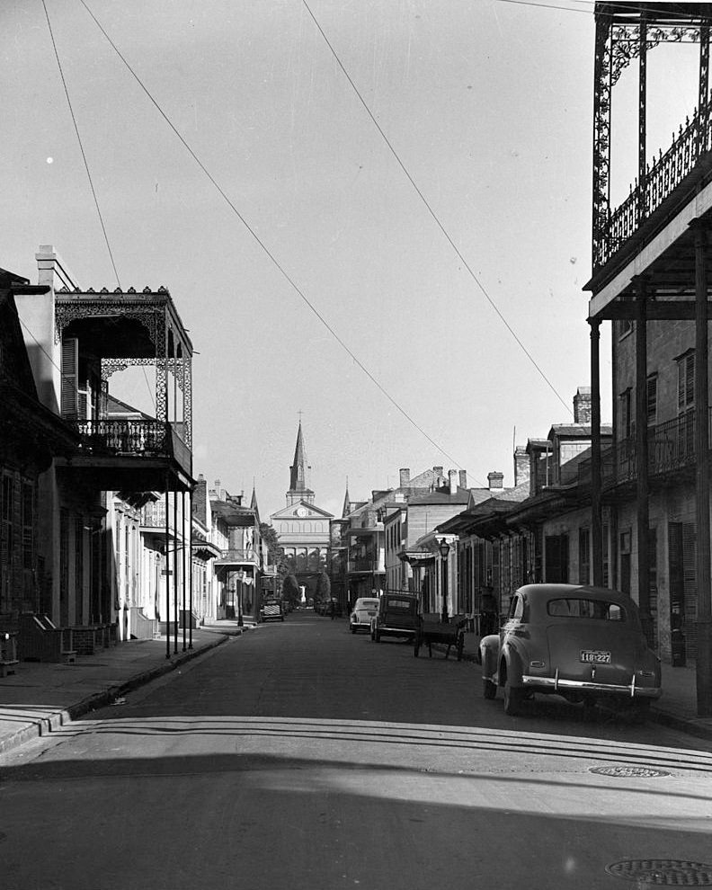 #20 Corner of Dauphine and Orleans looking down Orleans at the back of the St. Louis Cathedral, 1950