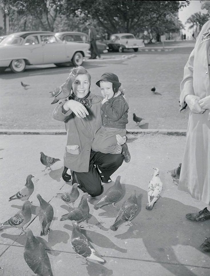 #15 Mother and Son Feeding Pigeons, New Orleans, 1950s