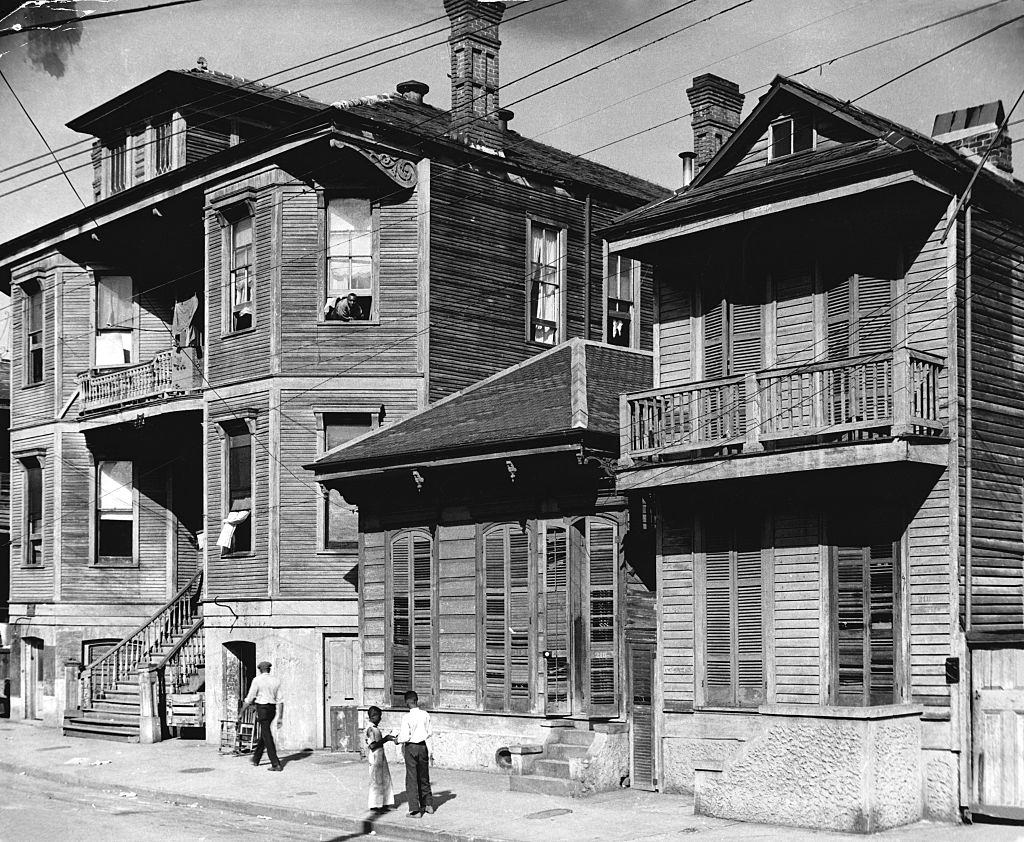 #5 A street in New Orleans lined with timber houses, New Orleans, 1950s