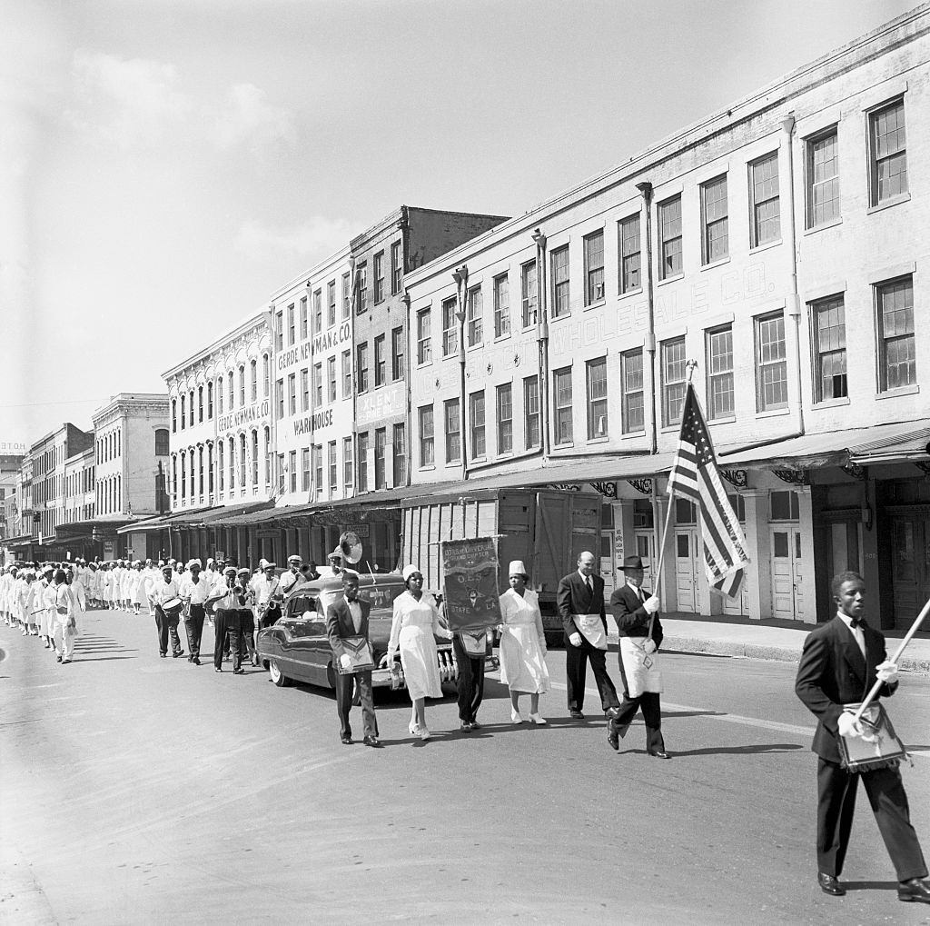 #84 A parade of the Daughters of the Universal Chapter of the Order of the Eastern Star, a charitable organization, in New Orleans, 1955.