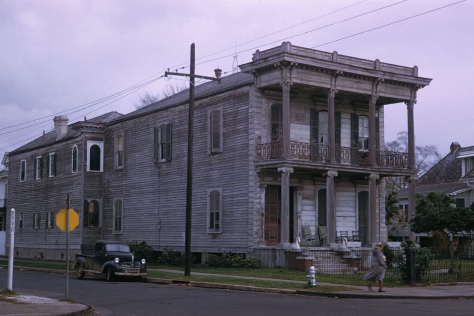 #90 Deep, 2-story frame house unpainted, with high pillars on Esplanade Avenue at Miro Street, New Orleans, 1951.