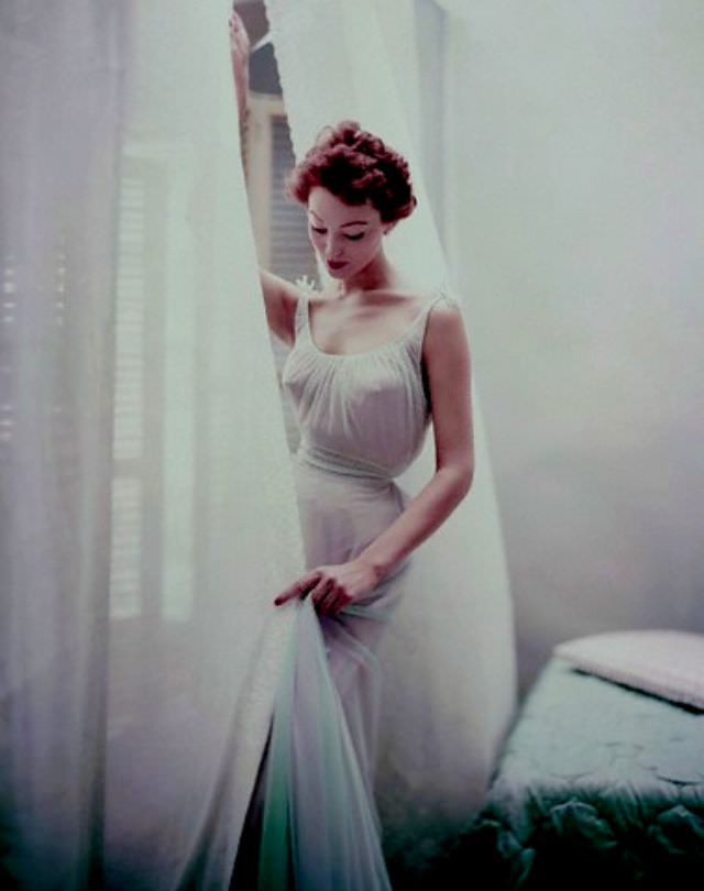 #3 Model is wearing a pale blue chiffon nightgown by Carter’s, 1952