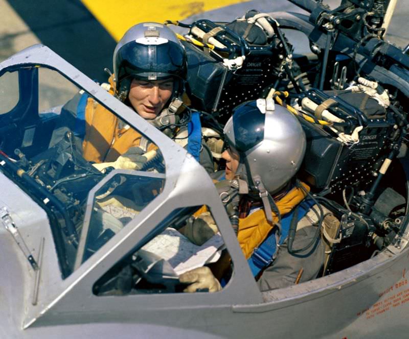 #23 Flying Instructor Flight Lieutenant J Davis with his student, Flight Cadet TC Porteous of No. 76 Entry, in a De Havilland Vampire T11 at the RAF College Cranwell, Lincolnshire, 1959